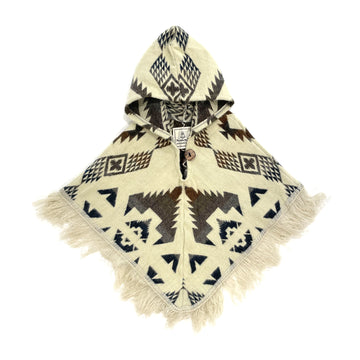 front of baby poncho with a hood and fringe with a cream color background and gray, brown and blue patterns
