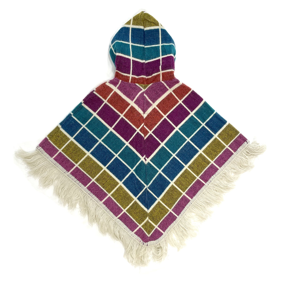 back of baby poncho with hood and fringe with stripes with blue, green, pink, red and purple colors and a white grid pattern on top