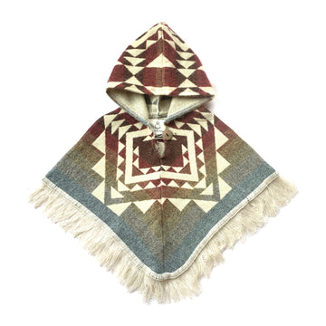 front of baby and toddler poncho with hood and fringe in the bottom, with colors red, orange, yellow, blue with white patterns on top