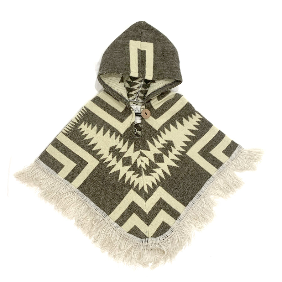front of baby and toddler poncho with a hood and fringe in the bottom with a base color of a gray/brown and cream color shapes and lines on top