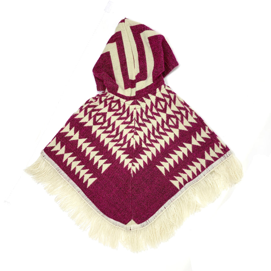 back of poncho that is two colors, plum and white. the pattern is mostly triangle shapes that form arrows. the hood has white lines patterns