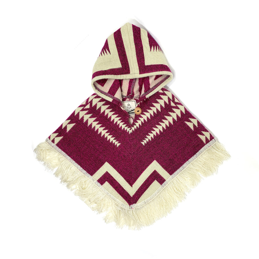 front of poncho that is two colors, plum and white. the pattern is mostly triangle shapes that form arrows. the hood has white patterns
