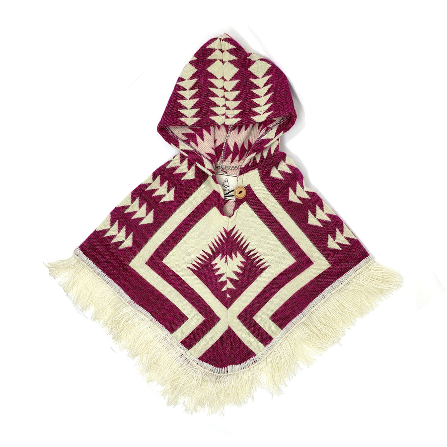 front of poncho that has 2 colors. a plum color and white. the pattern has some rhomboid shape in the middle and the hood has triangle forming arrows